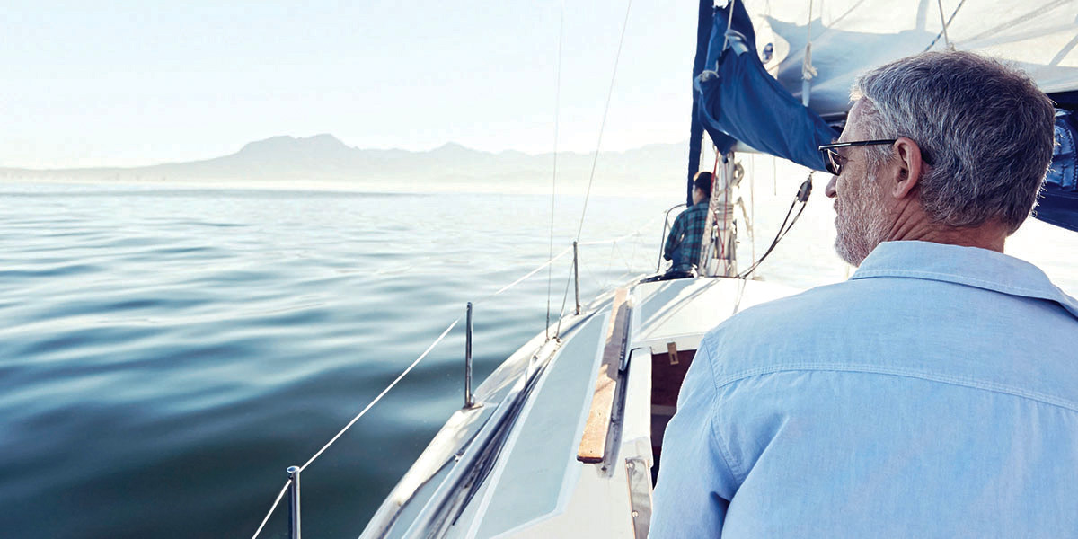 A group of investors celebrate their success with a relaxing ride on their Yacht.